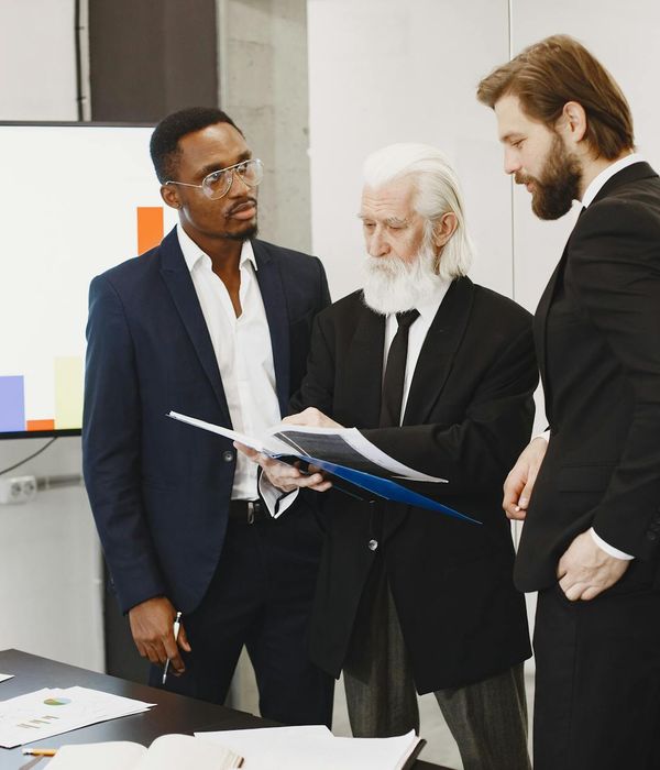 Corporate team reviewing business strategy options during planning session