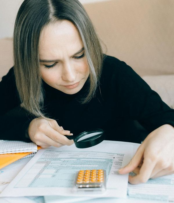 Risk management specialist reviewing assessment matrix